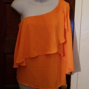Classy layered blouse. Hangs off one shoulder